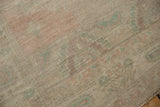 Distressed vintage Oushak rug pile with faded pale pink, sea foam green, ivory.