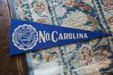 Blue felt pennant showing beige 