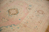 Even wear across the knot heads on a distressed Oushak rug runner.