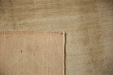 Back corner of a vintage Oushak rug showing its tidy, hand-knotted wool foundation.