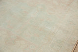Even wear across the knot heads shown on the distressed pile of a vintage Turkish rug.