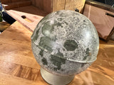 Vintage 1970s Moon Globe Piggy Bank with detailed grey-green cratered surface.