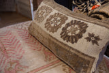 Vintage hand-knotted Turkish rug fragment pillow with geometric brown and ivory.