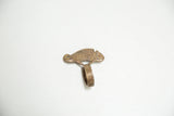 High-angle view of the vintage African bronze chameleon ring showing its sculptural form.