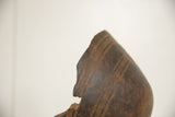 Weathered, chipped edge and hand-carved line details on the primitive wood bowl.