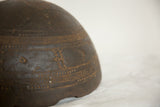 Dark brown hand-carved primitive geometric patterns on vintage African wood bowl.