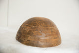 Textured surface and carved geometric patterns of a primitive vintage African bowl.