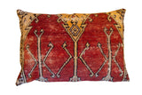 Hand-knotted Vintage Oushak Rug Fragment Pillow in muted red, gold, and black geometric patterns.