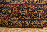 Vintage Rug Fragment Pillow, detail of early 20th century Kerman pattern, softened red, blue, gold.