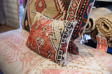 Textured side of the hand-knotted vintage Turkish Oushak rug fragment pillow.