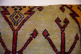 Hand-knotted texture and geometric red, black motifs on muted yellow-green vintage Oushak pillow.
