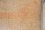 Hand-knotted pile, vintage Turkish Oushak rug fragment, soft beige with muted pink.
