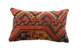 Vintage Rug Fragment Pillow, geometric design in rust, deep blue, and golden tan, 20x12.