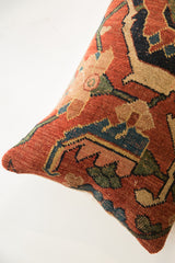 Hand-knotted pile texture of antique Bijar pillow with terracotta, navy, and beige pattern.