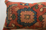 Antique Bijar fragment's hand-knotted texture, showing time-softened blue, green, and rust patterns.
