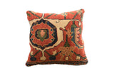 Antique Persian Bijar rug fragment pillow, circa 1910, with rust, indigo, cream medallion.