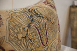 Intricate early 20th century Persian Kerman rug pillow design with mythical motifs in gold, blue, and crimson.