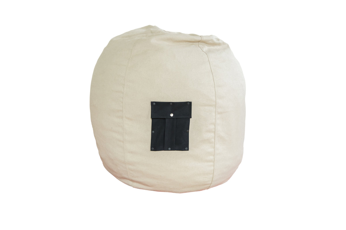 Adult-sized hemp bean bag chair in natural beige with black swappable pocket.
