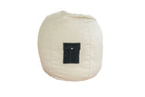 Adult-sized hemp bean bag chair in natural beige with black swappable pocket.