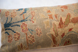 Texture of antique Persian Sultanabad pillow fragment, seafoam green, olive, red floral vinery pattern.