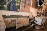 Two antique Persian Sultanabad lumbar pillows with seafoam, cobalt, madder floral vinery.