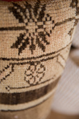 Distressed beige and brown hand-knotted pile texture of vintage Turkish Oushak fragment.