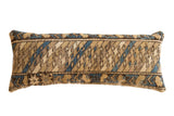 Reclaimed vintage Caucasian rug lumbar pillow with geometric patterns in muted blue, brown, and beige.