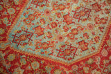 Finely hand-knotted vintage Senneh rug pile with intricate sea blue, tomato red motifs.