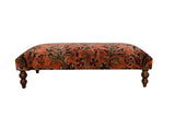 Vintage Persian Rug Ottoman Coffee Table, dusty rose Lilihan floral design, navy and gold accents, curved wooden legs.