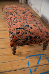 Vintage Persian Rug Ottoman detail: dusty rose Lilihan fragment, navy and gold floral patterns.