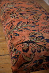 Hand-knotted Lilihan rug fragment with dusty rose field, navy, gold floral, vine pattern.