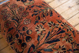 Hand-knotted vintage Lilihan rug fragment with dusty rose field and navy, gold floral design.