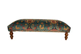 Reclaimed antique Persian rug ottoman with pictorial chickens and trees on a sapphire blue ground.
