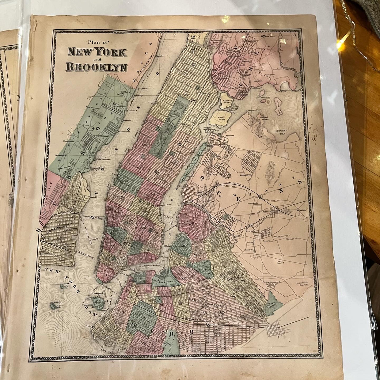 Original antique 1868 New York City and Brooklyn map, pastel-colored with detailed street grids.