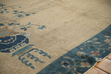 Peking carpet corner with deep sapphire blue potted plant motif and speckled ivory field.