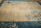 Peking carpet arts and crafts floral corner with blue, copper on textured ivory.