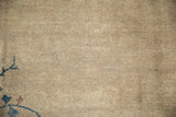 Textured antique ivory pile of a vintage Peking carpet with light speckling.