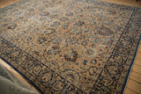 Navy blue border and light bronze field detail with Shah Abas floral palmettes.