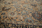 Vintage Meshed carpet with Shah Abas floral palmettes in blues and bronze, navy border.