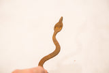 Vintage Iron Snake with textured, rust-colored head and upper body.