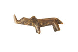A small vintage bronze rhinoceros sculpture with a stylized shape and aged, textured patina.