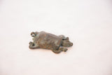 Side view of vintage African copper turtle, showcasing its rich patina and textured shell.