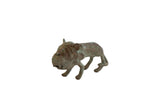 Vintage African wild animal sculpture in oxidized copper with a textured green patina.
