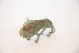 The powerful stance and textured green patina of a vintage African copper wild thing.