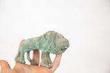 Oxidized face and handmade details of a vintage African copper wild thing sculpture.