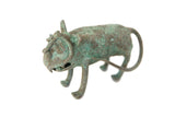 Vintage African oxidized copper animal sculpture with a textured green and brown patina.