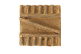 Vintage African square bronze coin with a handmade geometric pattern and a rustic, aged patina.