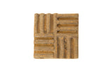 Vintage African square bronze coin with a textured geometric pattern and earthy patina.