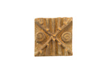 Vintage African square bronze coin with a rustic texture and raised geometric pattern.