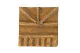 Vintage African square bronze coin with a rustic, handmade texture and raised geometric pattern.
